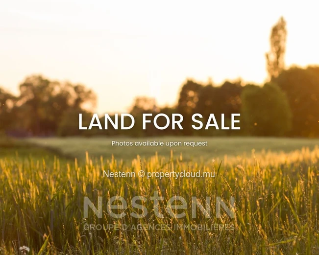 Prime land for sale in Bel Air, 50 Perches with mountain views, close to school, bus stop, and shops.