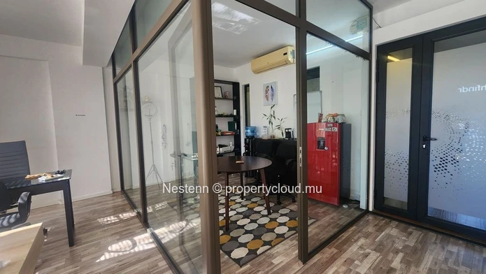Furnished office space in Ebène of 28 m², air conditioning, private lift, secured parking, mountain view, and close t...