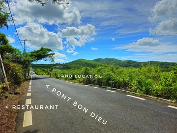 Golden Opportunity: Large Plot with Stunning Mountain and Sea Views, on the main road.