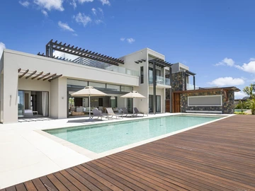 Luxueux Duplex de 4 chambres à vendre avec vue panoramique sur la mer et le golf à Anahita Beau Champ
