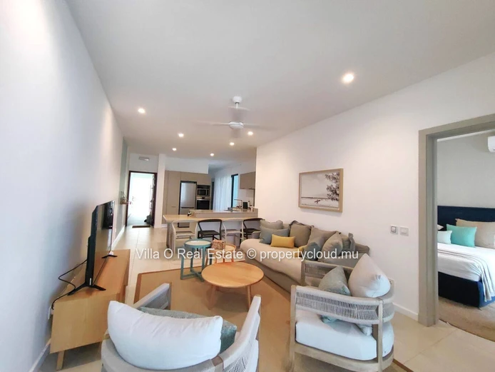 Dans une résidence sécurisée pieds dans l'eau, jolie appartement clé en main, de plain-pied avec un jardin privatif p...