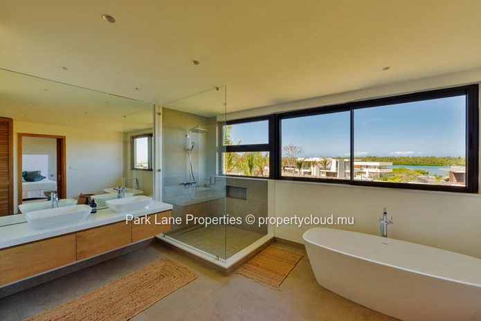 Bohemian Villa with Lagoon & Mountain Views for sale at Beau Champ.