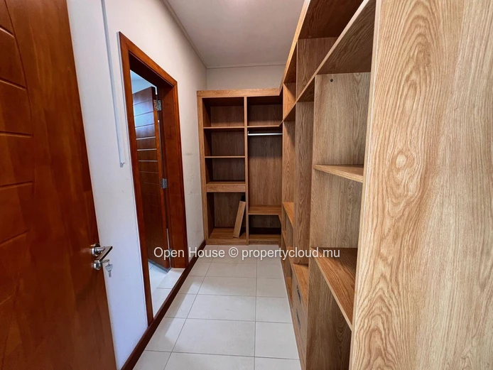 Architect-designed villa in Mon Choisy, featuring 4 bedrooms, 3 bathrooms, 1 office, and a swimming pool.