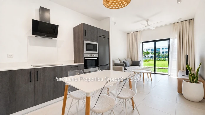 New 2-bedroom ground-floor apartment with communal pool in Beau Plan