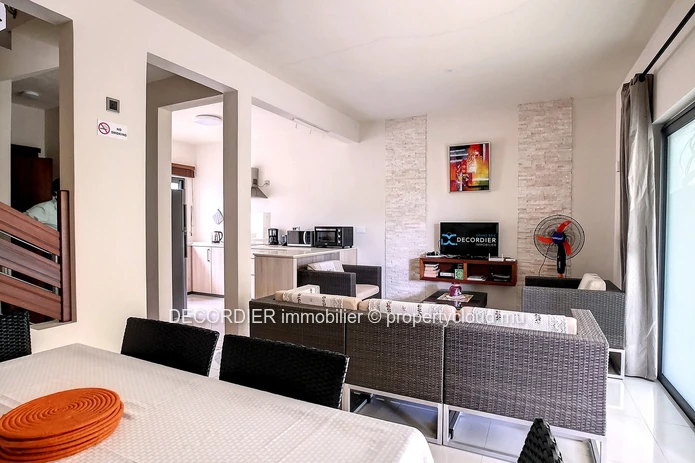 Duplex in residence with communal swimming pool
