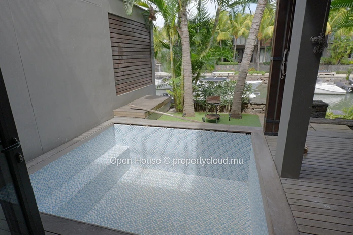 IRS VILLA for sale in Rivière Noire, Black River. 248m² living space, private pool, boat mooring.