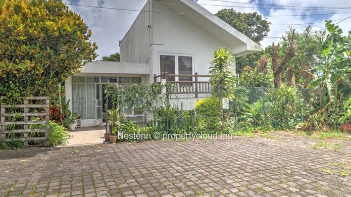 Maison 2 chambres vec jardin et potentiel d'extension