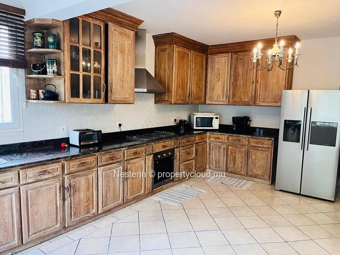 Spacious 4-bedroom duplex villa with pool