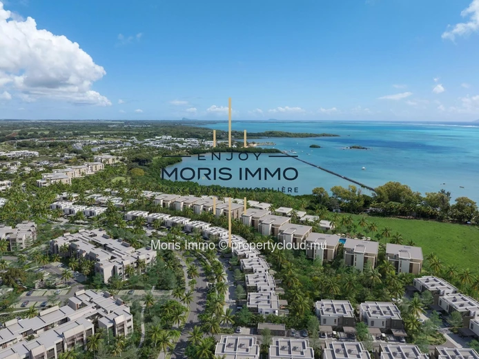 Vivez le luxe en bord de lagon – Townhouse 3 suites avec accès plage à pied.