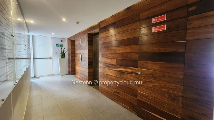 Furnished office space in Ebène of 28 m², air conditioning, private lift, secured parking, mountain view, and close t...