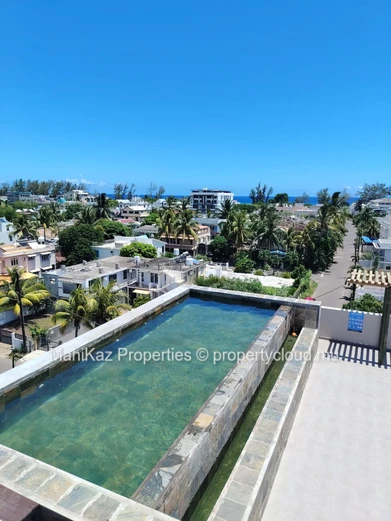 Modern 3-Bedroom Apartment for Rent in Flic en Flac, Mauritius – Rooftop Pool & Sea Views