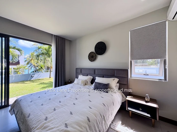 Appartement de 3 chambres avec accès mer à Blue Bay