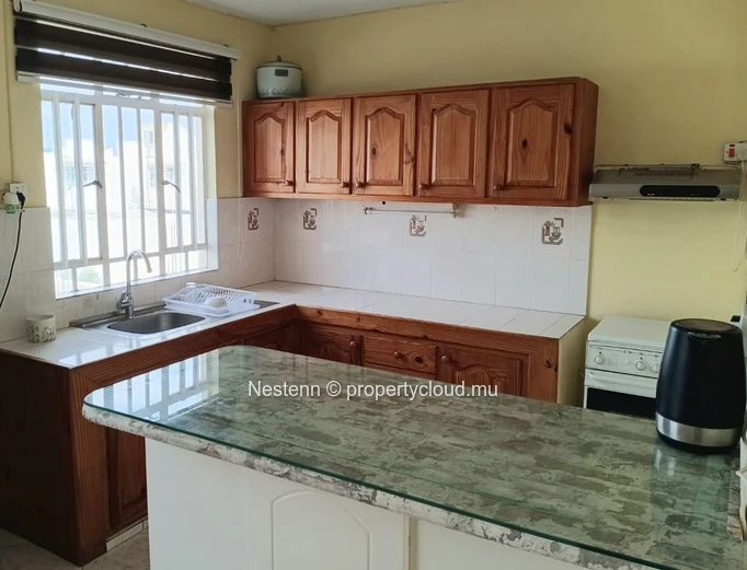 Appartement dans maison traditionnelle mauricienne dans un quartier résidentiel