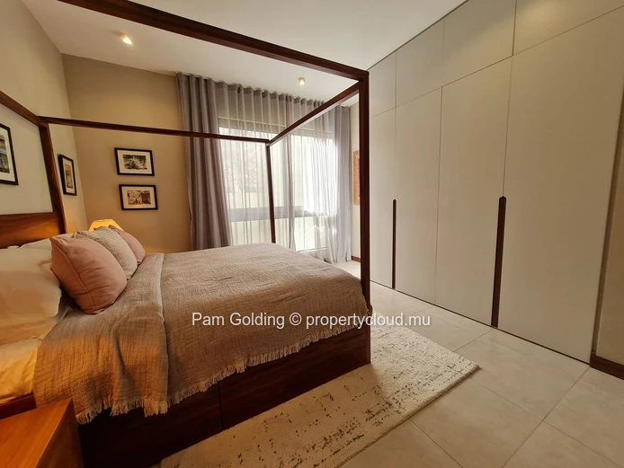 Appartement de 2 chambres en rez-de-jardin à vendre à Pointe aux Canonniers, Île Maurice | Jardin, piscine et plage à... (Mandat exclusif)