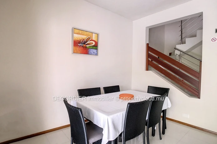 Duplex in residence with communal swimming pool