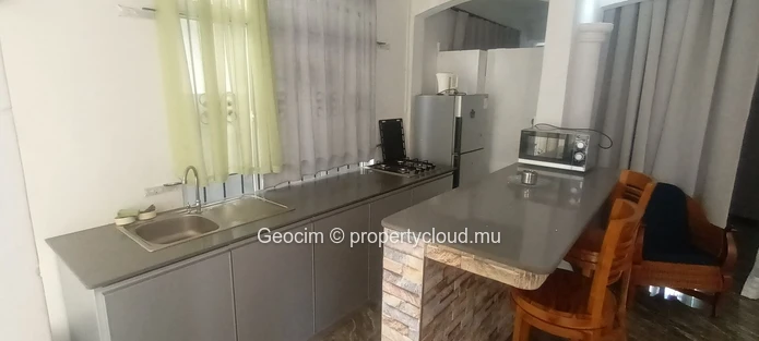 Flic en Flac Morc De Chazal fully furnished 3 bedrooms flat. Rerrace. Parking. Available now. (Sole Mandate)