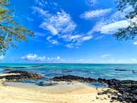 Stunning beachfront villa for rent at Roches Noires,  Fully furnished with elegance and style. 