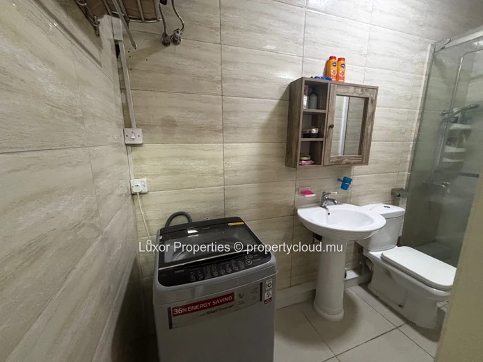 2-Bedroom Apartment in Flic en Flac | Rooftop Sea Views | Pool & Party Area 