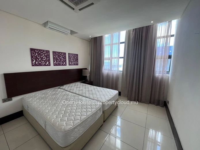 Appartement de deux chambres en suite au coeur de la croisette à Grand Baie. Piscine.