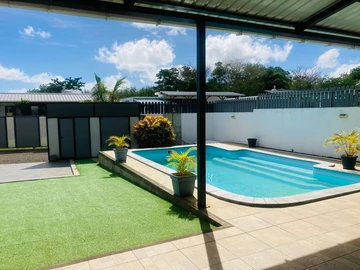 Luxury Villa for Rent in Grand Bay - 3 Bedrooms, Pool, and Garden