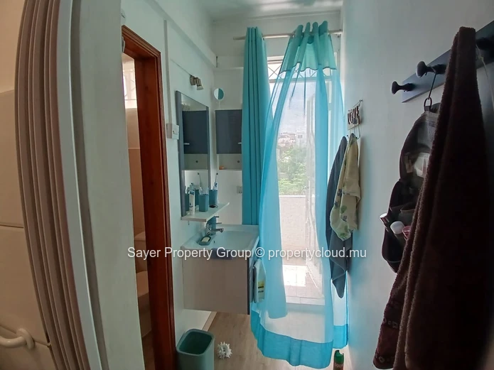 Rare Opportunity: Spacious Top Floor Apartment with Ocean Views