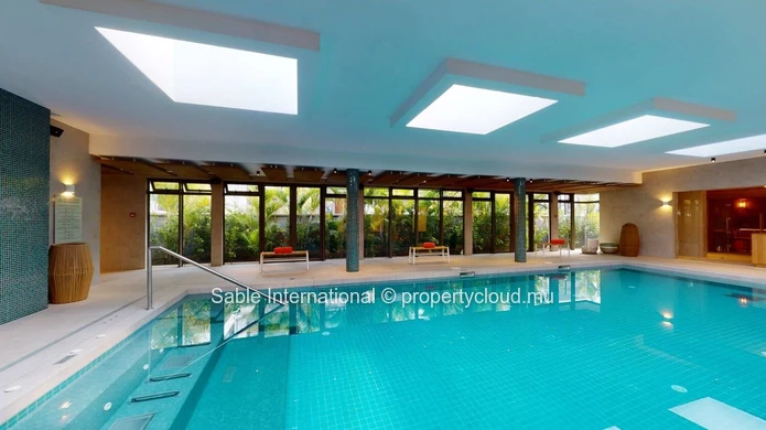 Luxury RES Apartment with Communal Pool in Prime Grand Baie Location! 2 Beds, Balcony, Indoor Spa, Close to Amenities.