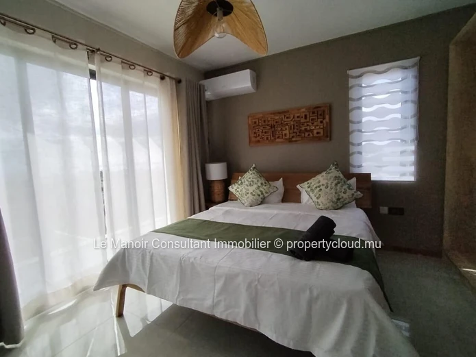 Villa moderne de 4 chambres en suite avec piscine privée- Morcellement sécurisé.