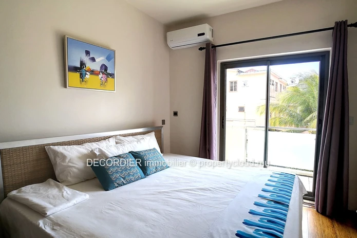 Duplex in residence with communal swimming pool