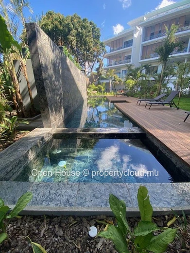 Exclusivité Pointe aux Canonniers. Splendide RDJ dans immeuble neuf, 3 chambres en suite, plage à 100m piscine commune. (Mandat exclusif)