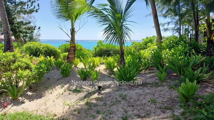 Appartement en bord de mer de 3 chambres avec jardin privé et accès direct à la plage