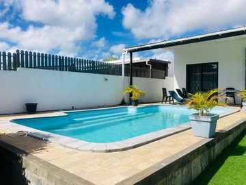 Luxury Villa for Rent in Grand Bay - 3 Bedrooms, Pool, and Garden
