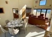 Enjoy breathtaking sea views and panoramic sights of Le Morne from this spacious and modern penthouse.
