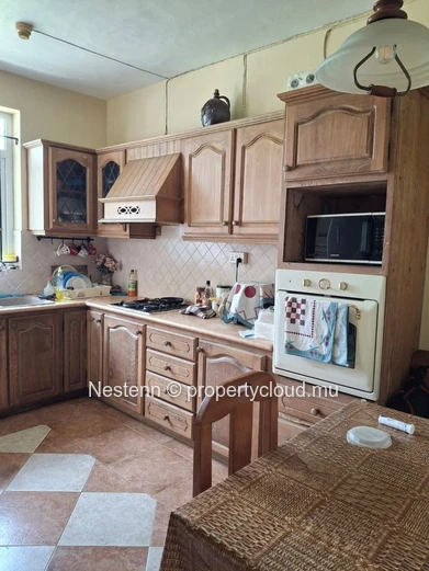 Traditional single-storey villa in La Marie with 3 bedrooms 2 bathrooms separate kitchen TV room garage and fenced ga...