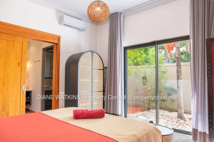 Élégante villa IRS de 4 chambres entourée de luxuriants jardins tropicaux à vendre à Rivière Noire