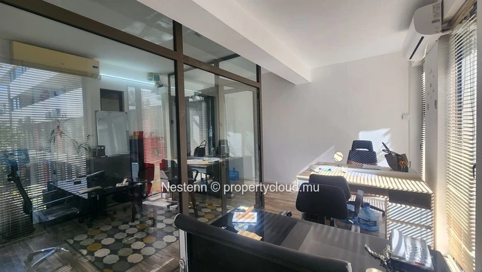 Furnished office space in Ebène of 28 m², air conditioning, private lift, secured parking, mountain view, and close t...