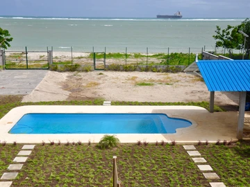 Modern beachfront duplex with pool near Port Louis