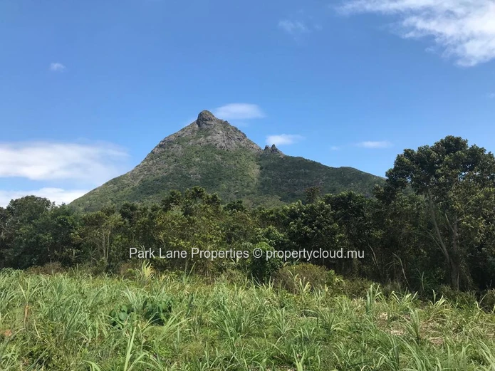 Vast plot of agricultural land with splendid views over mountain in St Pierre, Moka.