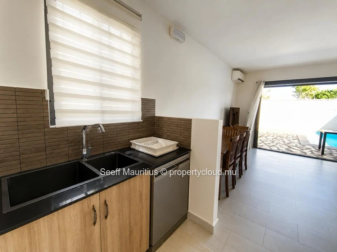 This splendid duplex features three bedrooms and three bathrooms
