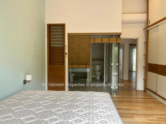 Exceptional corner apartment with private garden and heated swimming pool!