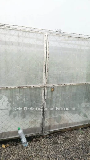 8.47 Perches Residential Land for Sale with Fully Equipped Greenhouse – Rivière des Anguilles