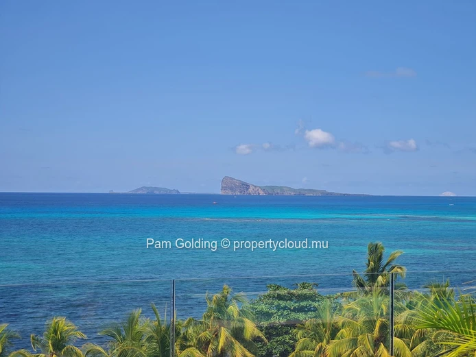 3-Bedroom Penthouse for Sale in Pointe aux Canonniers. Contemporary Design, Sea Views & Rooftop Pool