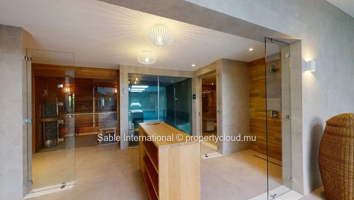 Luxury RES Apartment with Communal Pool in Prime Grand Baie Location! 2 Beds, Balcony, Indoor Spa, Close to Amenities.