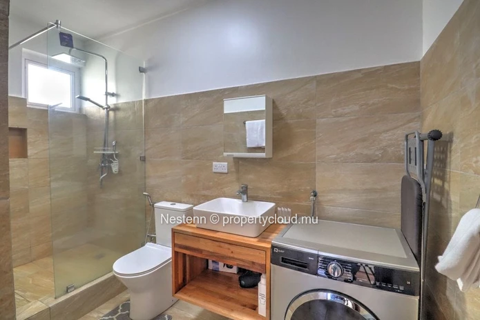 Charming 1-bedroom apartment in Grand Baie with modern amenities, close to schools and shops, ideal for comfortable l...