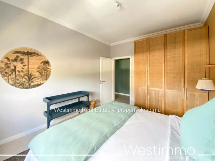 Flic en Flac - Luxueux appartement pieds dans l'eau avec piscine et vue sur le lagon.