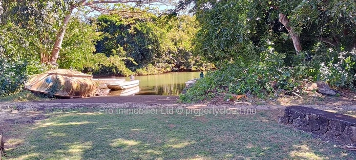 Elegant Riverside Villa for Sale in Secure Gated Community - Providence sur Mer, Belle Mare.