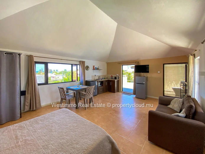 Long-term rental: Furnished studio with terrace and sea view for rent in Grand Gaube, Mauritius.