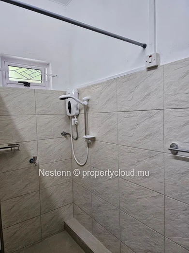 Appartement spacieux de 2 chambres à Blue Bay, à distance de marche de la plage