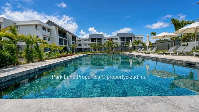 New 2-bedroom ground-floor apartment with communal pool in Beau Plan