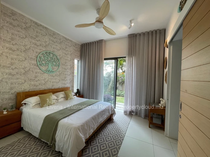 Élégant Appartement au Rez-de-Chaussée de 2 Chambres
