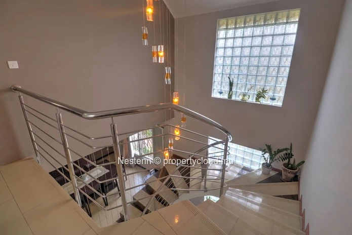 Spacious family home with swimming pool and beautiful living spaces